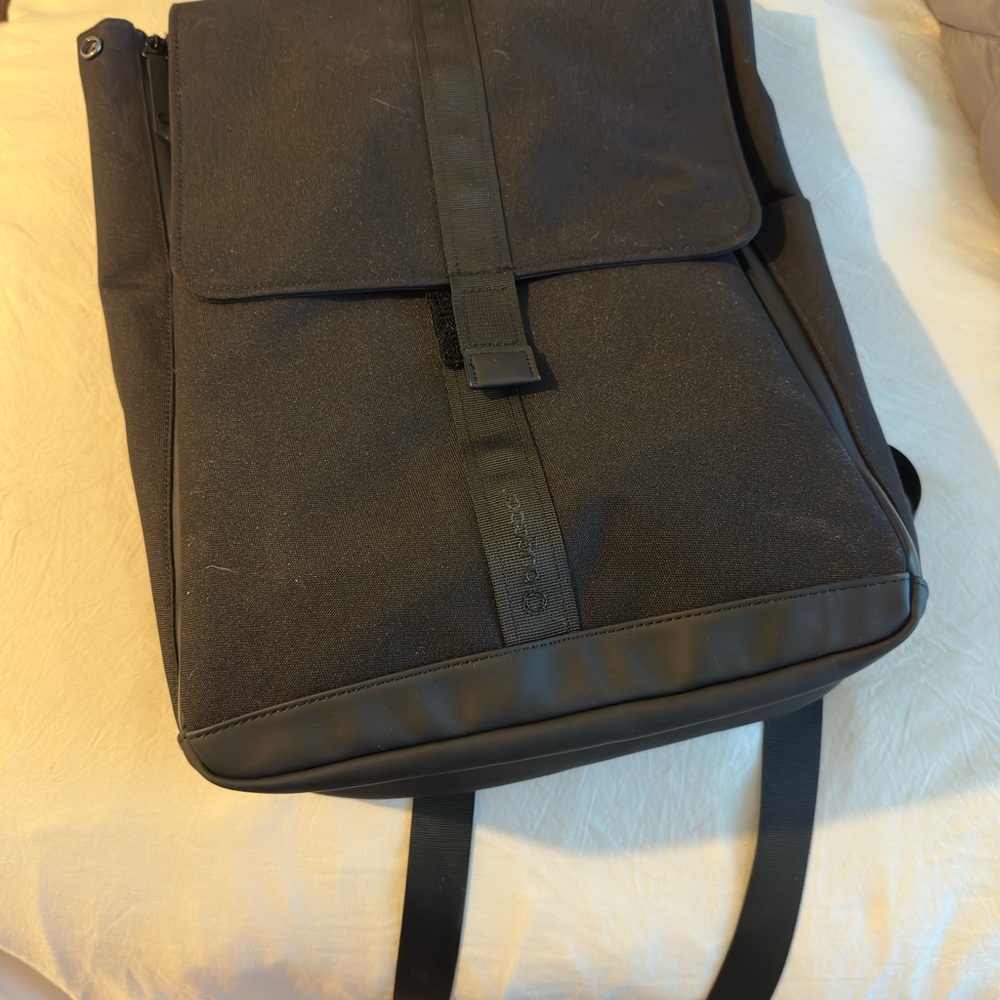 Sleek Black Minimalist Backpack with Flap Closure